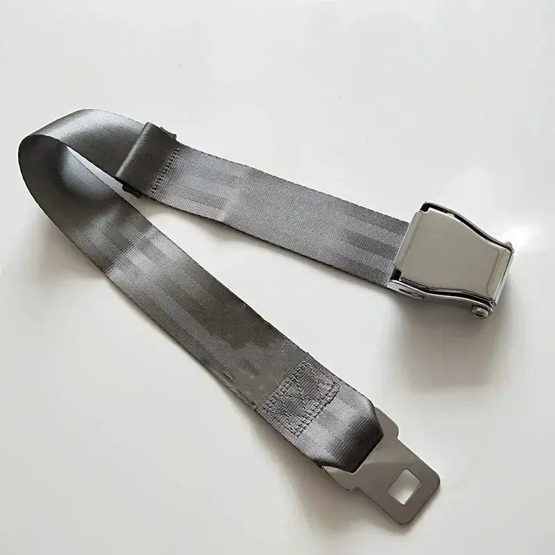 Gray Type A airplane seat belt extender with polished metal lift-latch buckle and adjustable nylon strap .