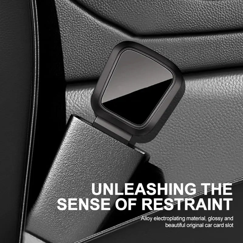 BYD seat belt extension plug installed in car buckle showing glossy alloy electroplated finish