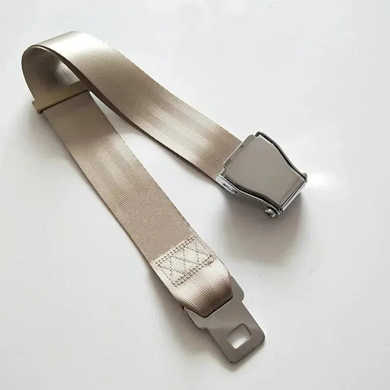 Beige Type A airplane seat belt extender with polished metal lift-latch buckle and adjustable nylon strap
