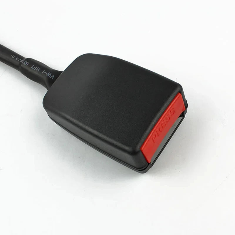 Close-up view of black housing and red press release button on a flexible wire stem seat belt buckle receiver