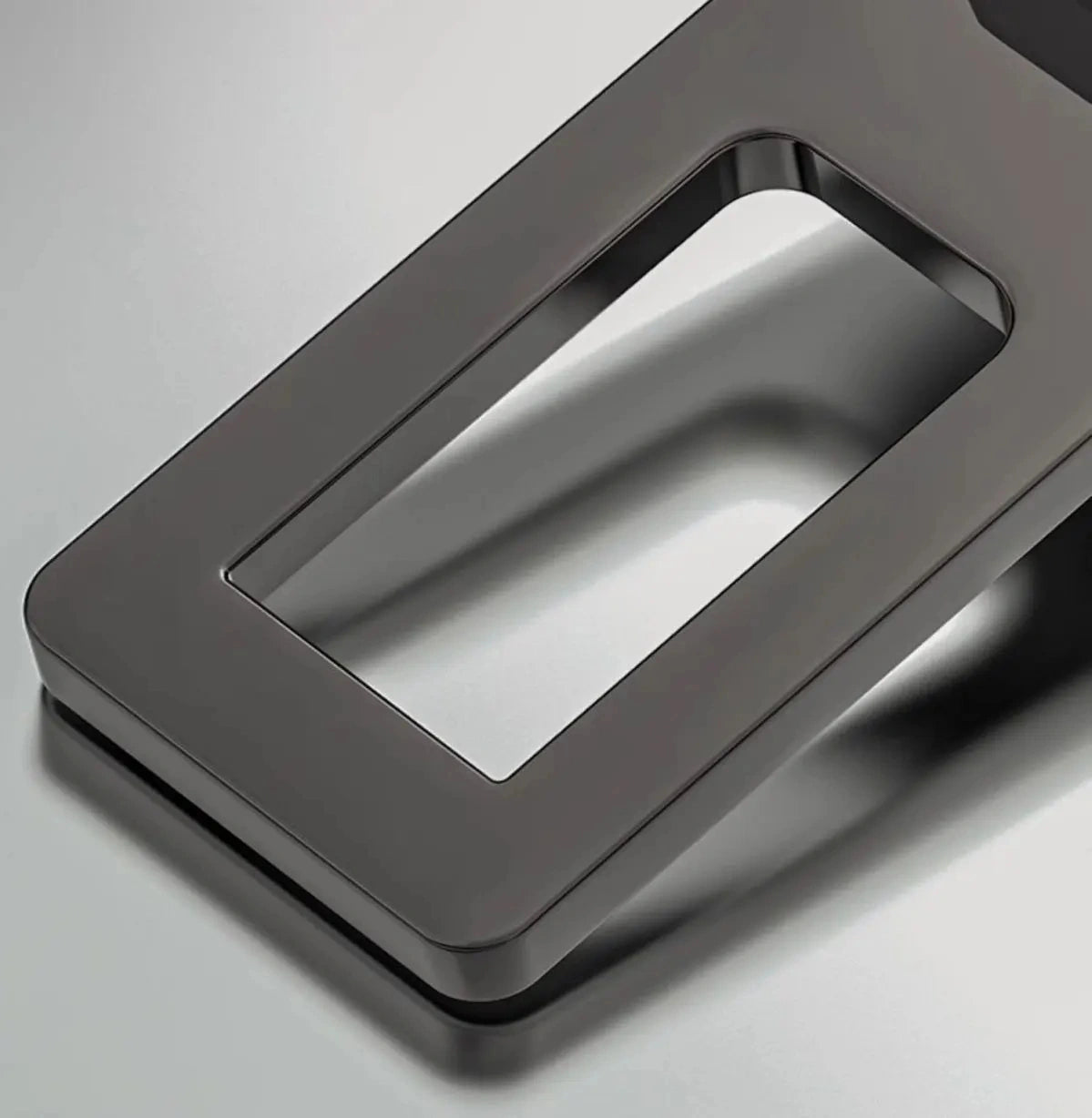 Macro view of Nissan seat belt extender's metal locking tongue and buckle slot