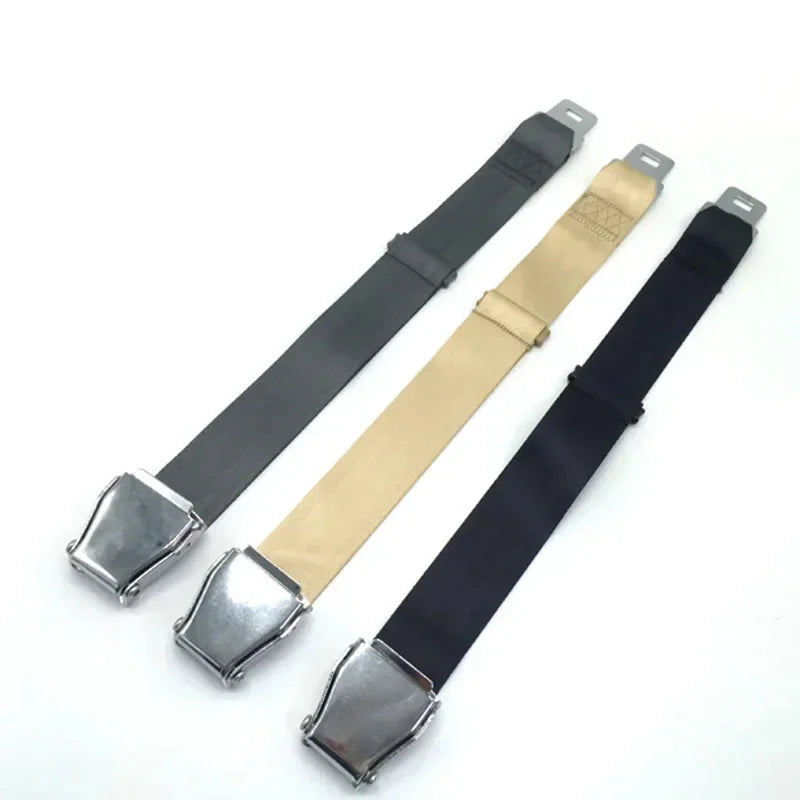 Three adjustable 18-81 cm Type A airplane seat belt extenders in gray, beige, and black