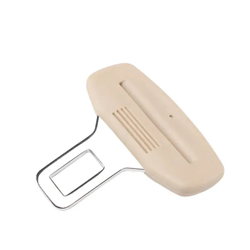 Beige seat belt chime mute clip designed to silence passenger seat alarms for cargo