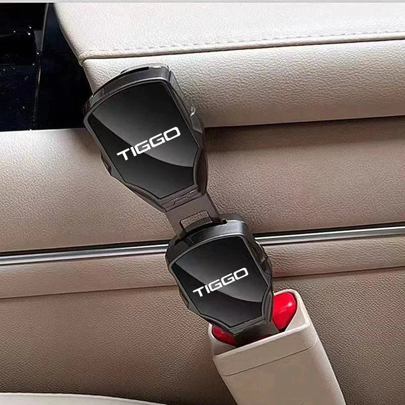 Chery Tiggo metal seat belt clip extender inserted into seat belt buckle in beige car interior