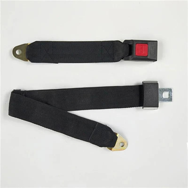Two black car seat belt extender strap components featuring a red buckle button, metal tongue, and gold-toned mounting brackets