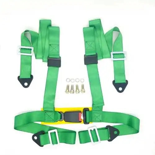Universal 4-point racing harness in green showing complete layout with 2-inch nylon webbing, press buckle, snap-in brackets, and eye bolts.